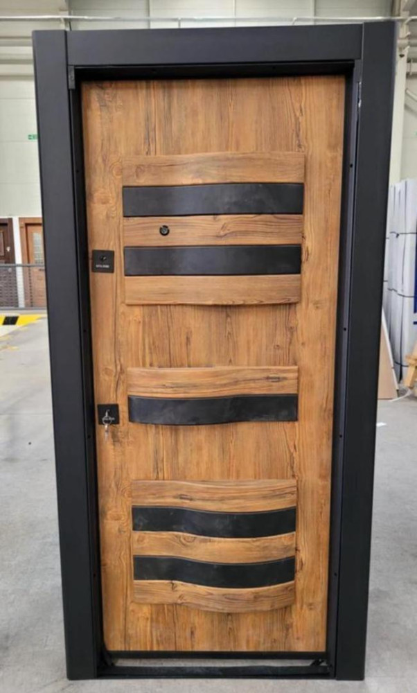 Modern Turkish Security Door featuring a wood-like finish and black horizontal accents