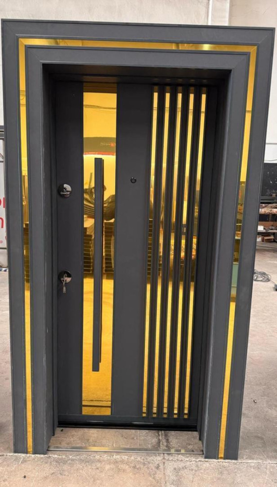 is a modern grey and gold turkish Security Door