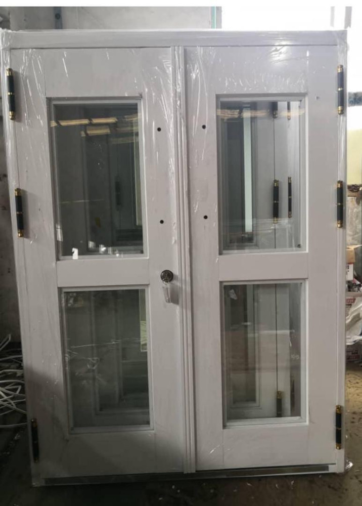 Hinged double aluminum and glss door unit