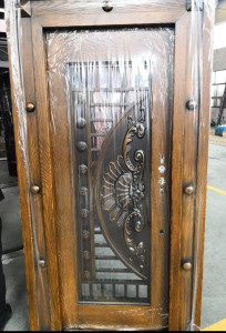 Security Door likely made of steel or cast aluminum with a wood grain finish