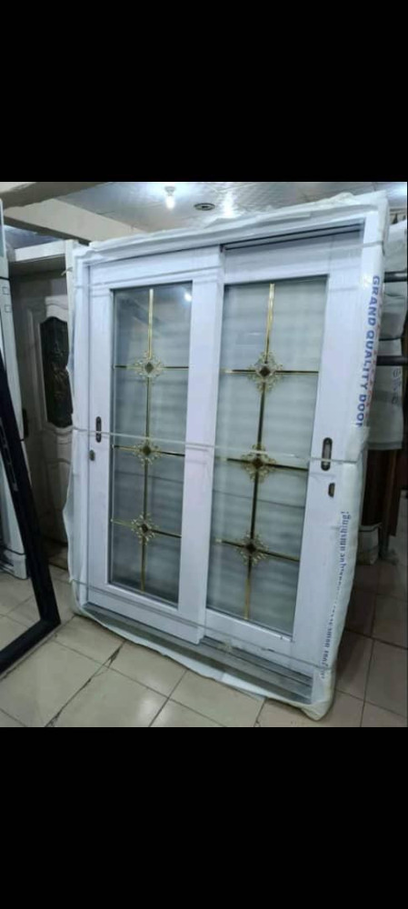 Grand Quality Door with uPVC or Aluminum sliding patio door with decorative gold insert