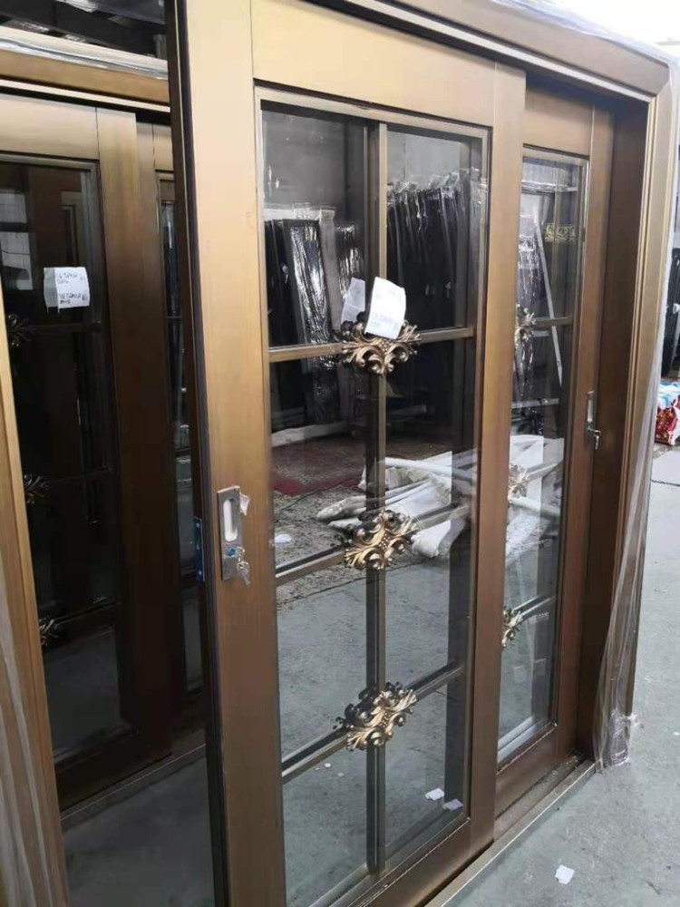 Modern double Security Steel entry door with glass panels and a stainless steel finish