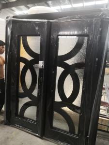 This is duble-entry wrought iron door with contemporary circular design 
