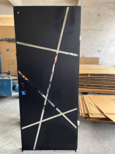 Black Security Door with decorative geomatric metalic strips