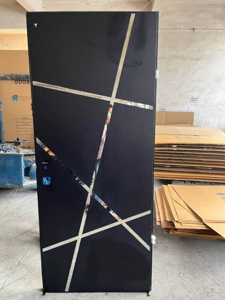 Black Security Door with decorative geomatric metalic strips