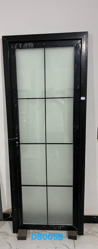 Pure aluminum toilet door with a black frame and double glazed frossted glass panels