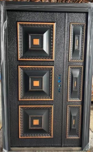 This is a security Door with a black and gold/copper finish