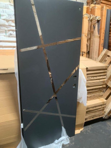 Madrid Israeli Security Door in a dark grey colour with a modern design featuring abstract