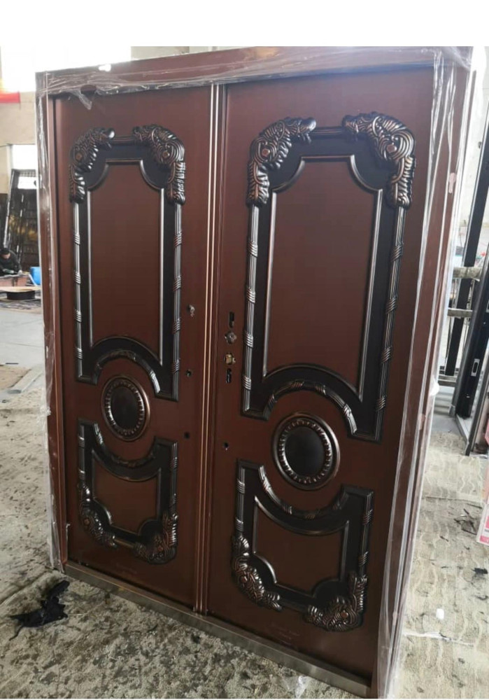 Turkish steel Security Door faturing decorative copper-coloured panel design