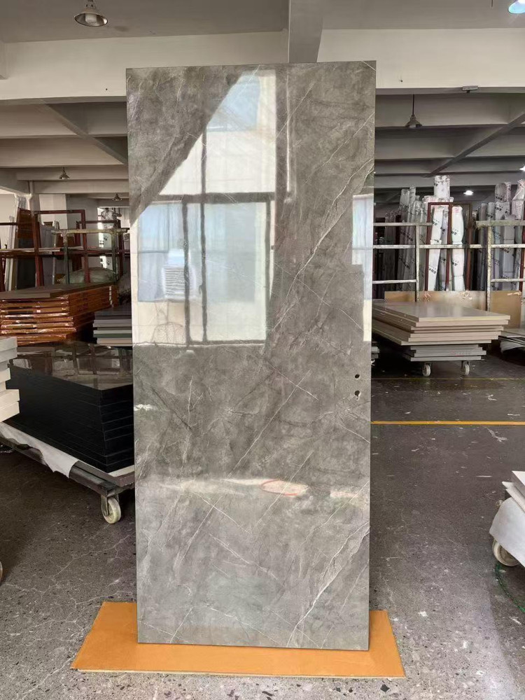large porcelain or marble-effect ceramic slab door