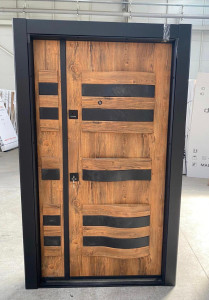 Modern turkish steel Security door featuring a wood-panel aethetic with stainless steel accents