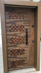 Modern Entrance door features a combination of vertical wood paneling and black textured metal often marketed as a security steel door