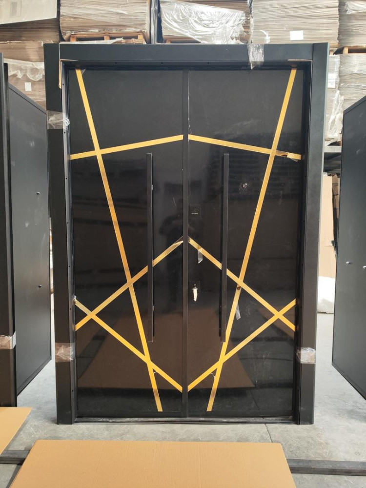 Luxury security door with a black and gold geometric design