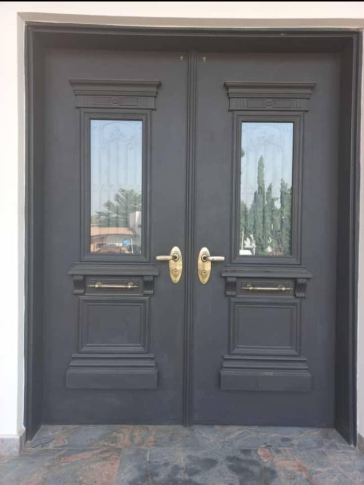 reinforced steel double security door with glass panel inserts 