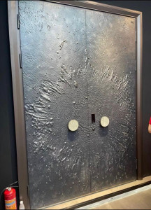 Textured, wrought iron double security door