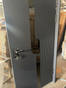Modern charcoal grey Entry Door features a distinctive geometric panel design