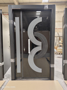 Turkish Security Door features sleek black finish with a modern grey geometric design