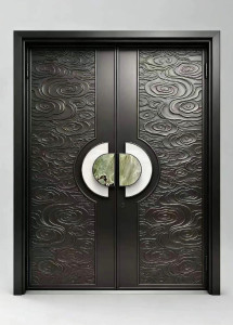 Modern double entrance dor with a decorative metal finish and integrated marble handles