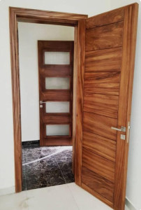 Modern interior wooden doors designed with a sleek flush panel look