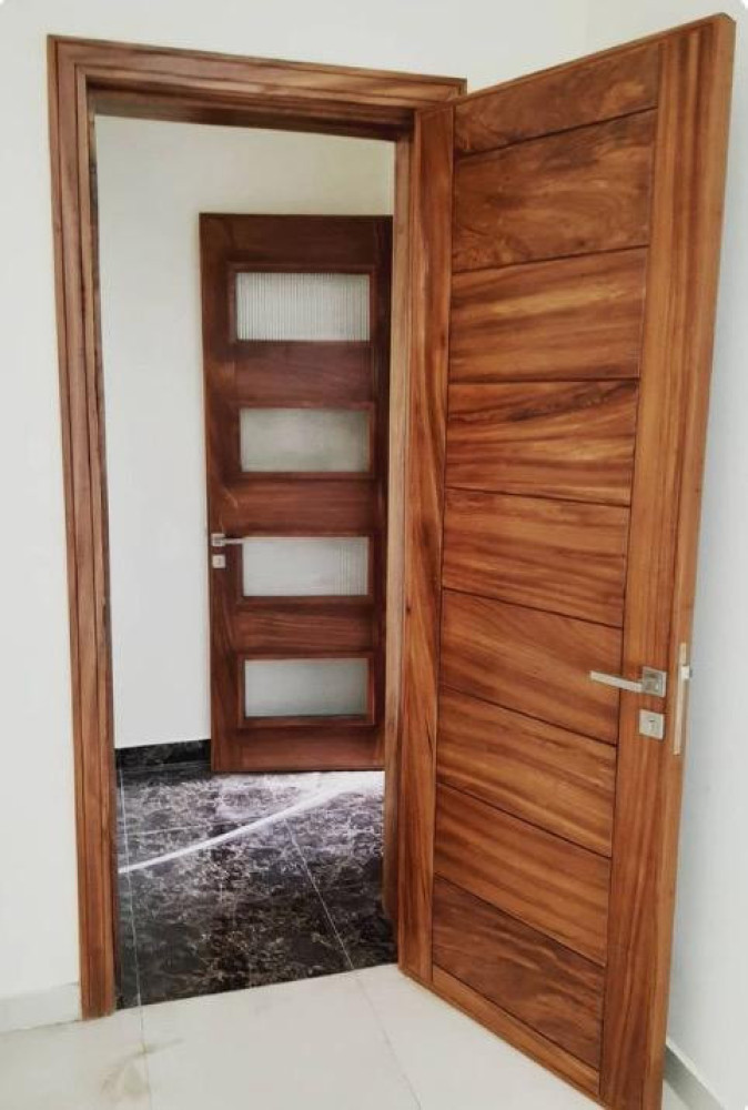 Modern interior wooden doors designed with a sleek flush panel look