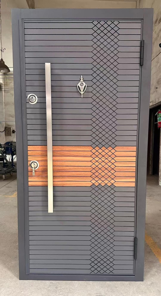 Turkish Steel Security Door featuring a modern grey design with a central vertical handle and a decorative wood panel accent