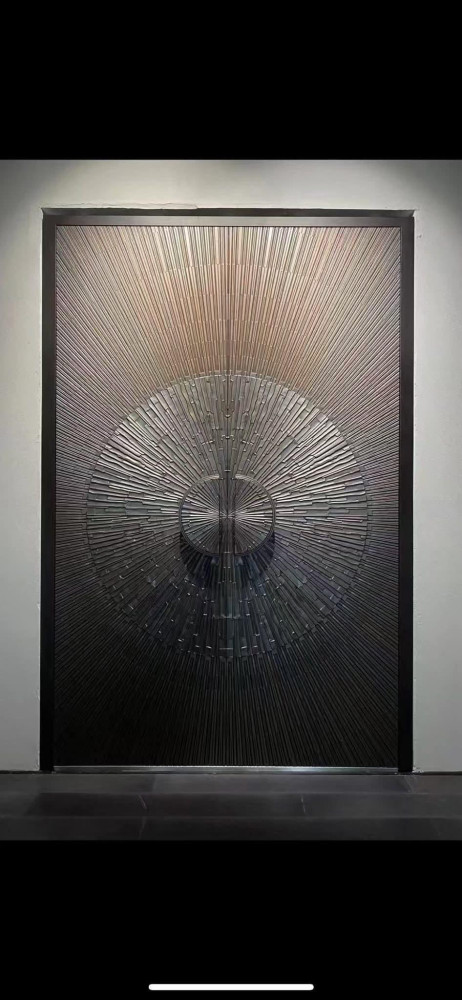 decorative door featuring a radial sunray pattern 