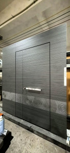 fush-mounted or concealed security door featuring decorative paneling