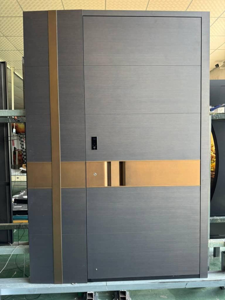 Modern luxury Pivot exterior security door with a reinforced steel structure, advanced lock system, and stylish aluminum cladding