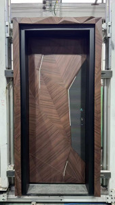 Modern Turkish Security Entrance door featuring a geometric wood veneer design and integrated metal accent