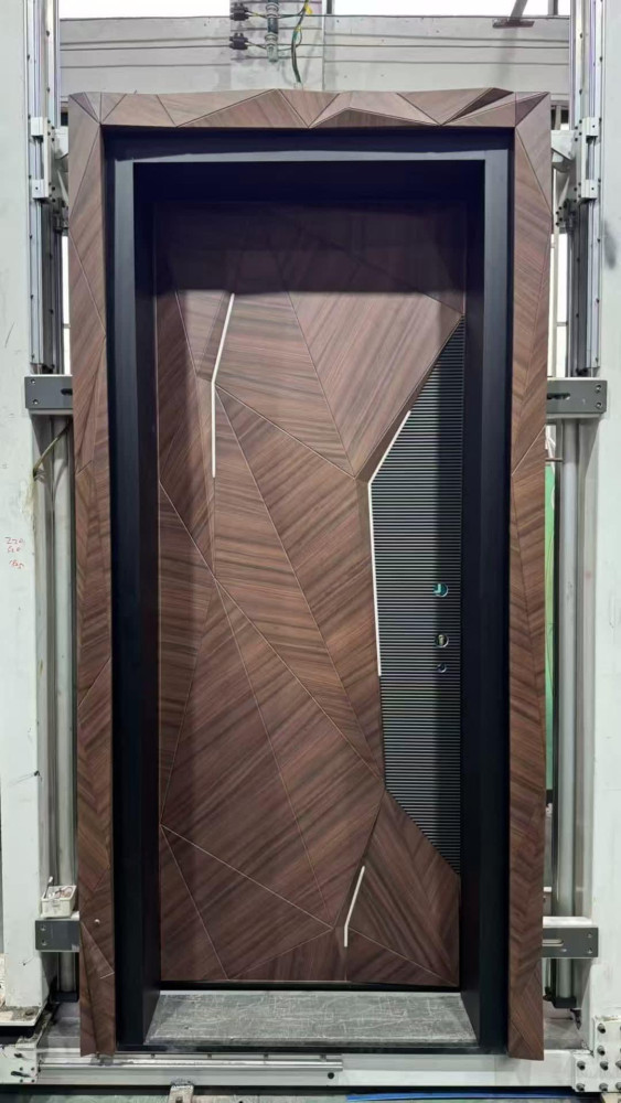 Modern Turkish Security Entrance door featuring a geometric wood veneer design and integrated metal accent