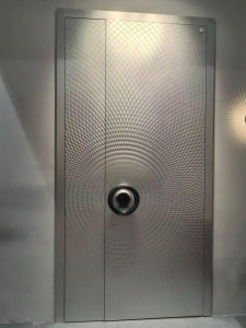 decorative security door, typically made of reinforced materials like steel to provide enhanced protection for residential or commercial properties
