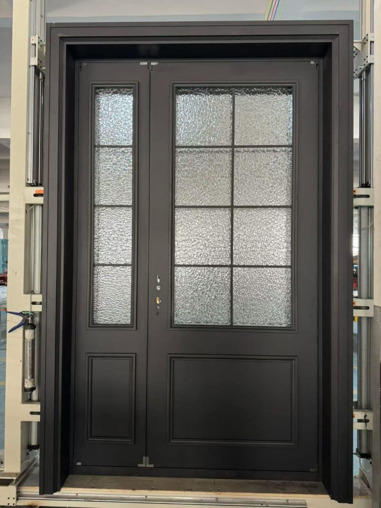 custom wrought iron entry door featuring a matte finish, large glass lites with a grid pattern, and privacy-focused aquatex