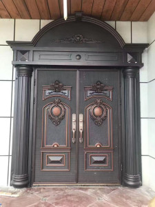 Decorative security entrance door, often referred to as a turkey panel or copper cast door