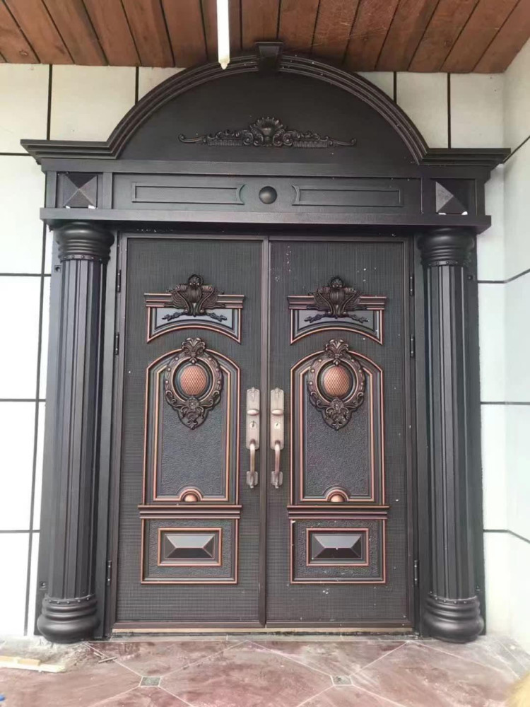 Decorative security entrance door, often referred to as a turkey panel or copper cast door